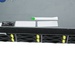 Close-up of ASRock Rack label and front drive trays.
