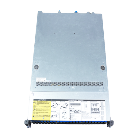 Overhead view of 2U rack server’s closed steel lid with a caution label and hardware quick-reference diagram.