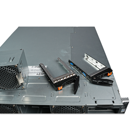 Angled close-up of fan module and drive trays on server lid.