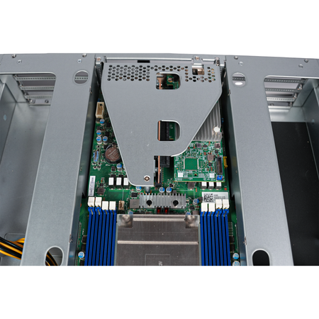 Overhead view of riser bracket above CPU heatsink and memory slots.