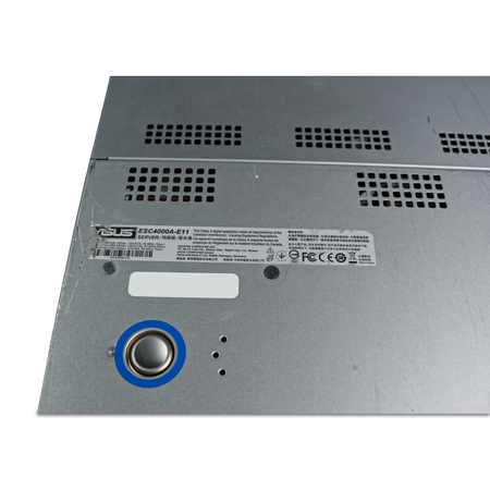 Close-up of server lid label and release button.