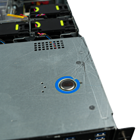 Close-up of scratched server lid with release button and cooling fans visible behind.