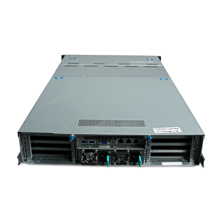 Rear-angled view of 2U server with dual power supplies and PCIe slots.