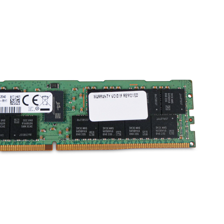 Close-up of a Samsung DDR4 RDIMM rear side showing memory chips, warranty void sticker, CE mark, and gold edge connector.