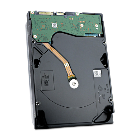 Back of Seagate Exos X18 18TB 3.5" SATA enterprise hard drive, angled view showing green PCB and SATA connector