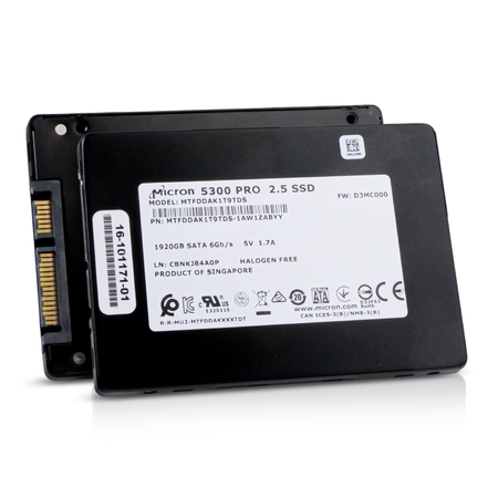 Two Micron 5300 PRO 1920GB SATA SSDs (model MTFDDAK1T9TDS), one showing the top label in front and one behind.