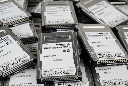 Enterprise NVMe and SAS drives laid out for serialized intake